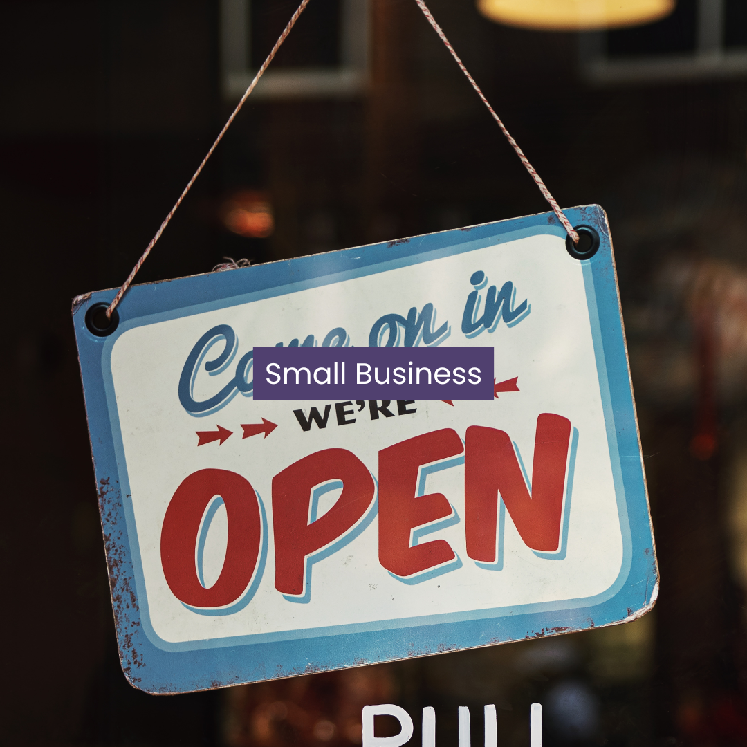 Small Business "come in we're open" sign on a business door
